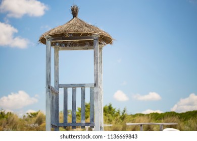 Close-up With Detail Of Lifeguard Tower With Thatched Roof