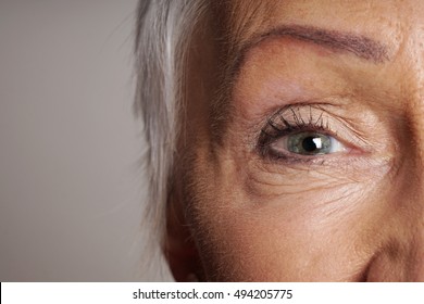 Close-up Detail Of Mature Woman With Green Eyes