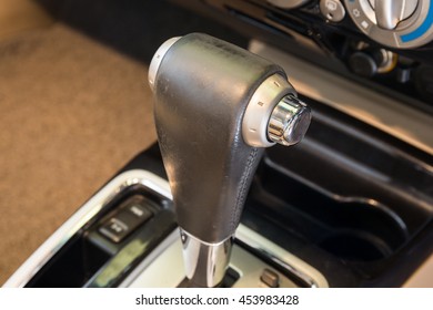 Closeup detail of modern car interior. Automatic transmission car select focus - Shutterstock ID 453983428
