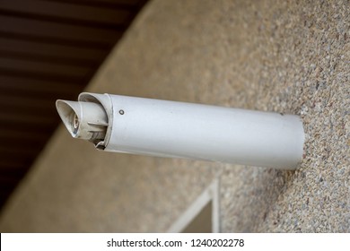 Close-up Detail Of New White Rigid Metal Ventilation Pipe Installed On House Exterior Wall Copy Space Background. Modern Technology, Renovation, Energy Saving, Professional Job Concept.