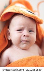 Close-up Detail Portrait Of Cute Little Peaceful Newborn Baby Boy Child Face With Beautiful Open Eyes. Love And Family Emotion