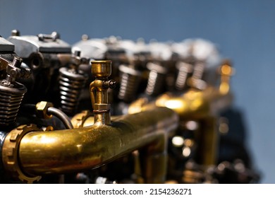 Close-up Of A Detail Of A Rare Car Engine. Metal Mechanisms. Automotive Industry.