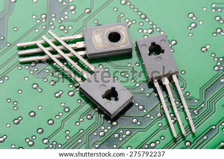 Closeup detail of transistors on circuit board
