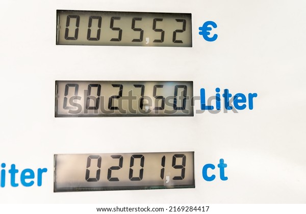 Close-up detail view of fuel pump digital display\
showing high rising super and diesel gasoline petrol price at gas\
refueling station in EU country. Energy cost raised expenses due\
war crisis Europe.