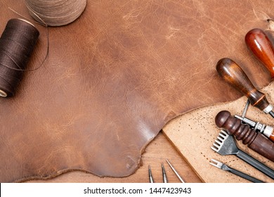 closeup details of brown leather, material for leather working.