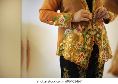 Close-up Details Shot Of Southeast Asian Woman In Traditional Malay Batik Kebaya Dress.