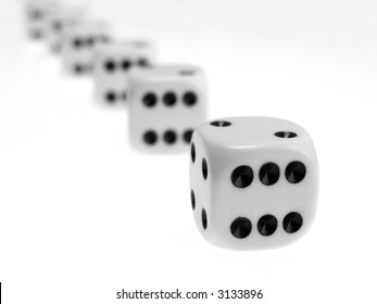 Close-up of dice on white table