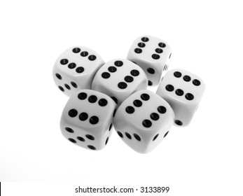 Close-up of dice on white table