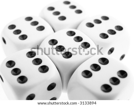 Close-up of dice on white table