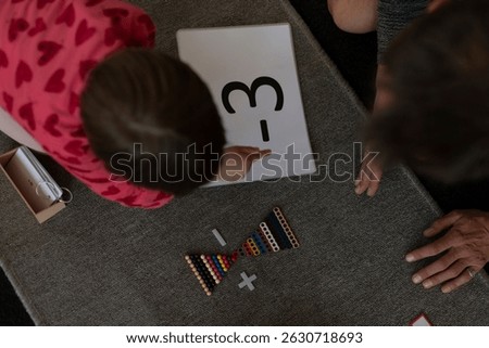 Close-up of didactic materials in an alternative primary school classroom. Hands-on learning tools.