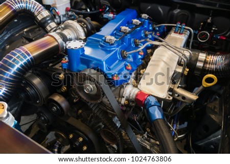 Close-up diesel engines racing. 