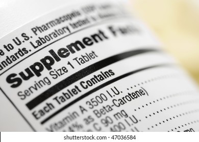 Closeup Of A Dietary Supplement Label Listing The Vitamins Contained Within Each Tablet. Horizontal Shot.