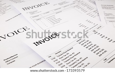 close-up difference invoices and bills, document and paperwork