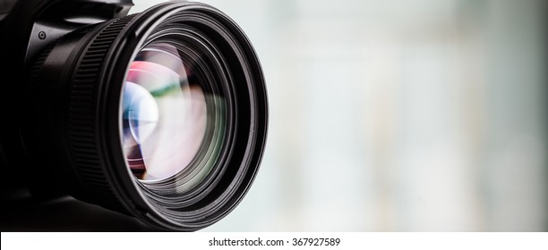 Closeup of a digital camera. Large copyspace