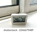 closeup of Digital Indoor thermometer with humidity monitor. Temperature and humidity monitor