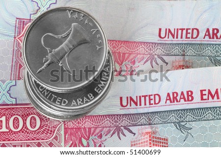 Closeup of dirham coins on notes