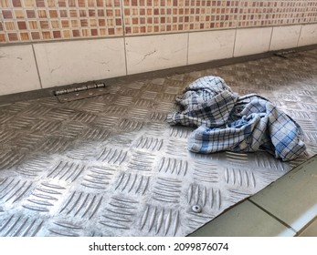 Close-up Of Dirty Cloth Napkin Isolated Steel Background