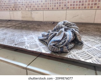 Close-up Of Dirty Cloth Napkin Isolated Steel Background