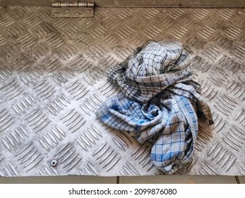 Close-up Of Dirty Cloth Napkin Isolated Steel Background