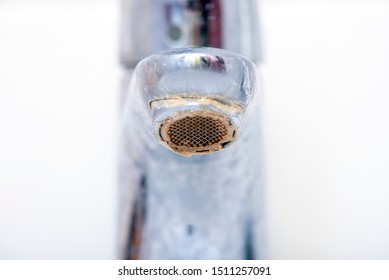 Close-up Dirty Faucet With Limescale. Sink Faucet With Rust. 