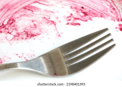 Close-up Of A Dirty White Plate After Eating