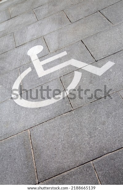 Closeup of\
Disabled Parking Sign on Diagonal\
Slant