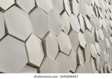 Close-up of the distinctive hexagonal tile pattern on the facade of Porto Leixões Cruise Terminal, highlighting modern texture and architectural geometry in natural light