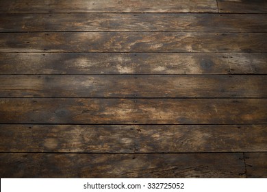 Closeup Of Distressed Wood Plank Floor