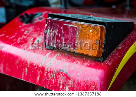 Close-up of dity truck tractor light indicator sign traffic transport accident automobile, background 