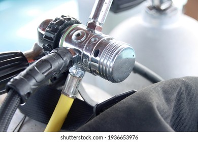 Closeup of diving gear valve on board of scuba diving boat. Valve of pressured air tank.