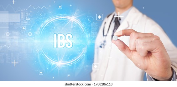 Close-up Of A Doctor Giving You A Pill With IBS Abbreviation, Virology Concept