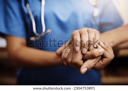 Closeup, doctor holding hands with senior woman and cancer care or support. Healthcare or trust, empathy or compassion and female caregiver or nurse holding elderly person hand for hope and kindness