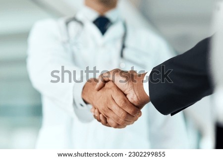 Closeup, doctor or man with handshake, negotiation or planning with partnership, healthcare or wellness. Medical professional, consultant or employee with an offer, support or teamwork with promotion