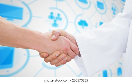 Closeup Of A Doctor And Patient Shaking Hands Against Apps Interface