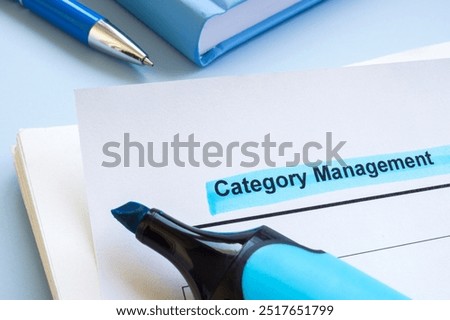 Close-up of documents about category management. Organizational strategy and product classification.