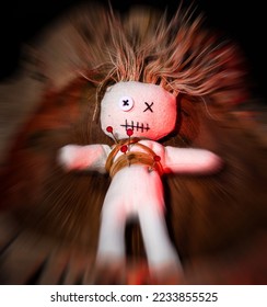 Close-up of a doll, needles stuck in it. - Shutterstock ID 2233855525