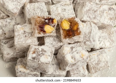 Close-up double roasted traditional delicious sweet treat turkish delight with hazelnuts - Shutterstock ID 2198849653