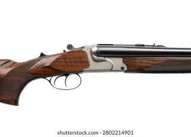 Close-up of a double trigger receiver on a wooden drilling rifle isolated on white.