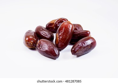 Closeup Of Dried Dates Palm On White Background.