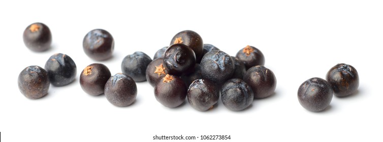 closeup of dried juniper berries isolated on white