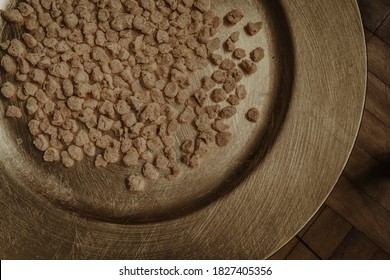 Closeup Of Dried Raw Soya Mince In Wooden Bowl