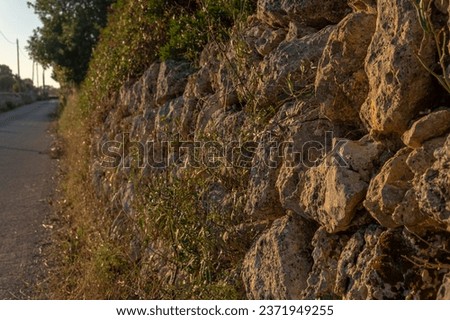 Close-up of a dry stone wall, marge, in a rural field on the island of Mallorca, Spain [[stock_photo]] © 