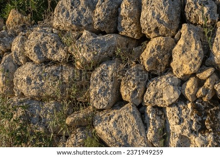 Close-up of a dry stone wall, marge, in a rural field on the island of Mallorca, Spain [[stock_photo]] © 