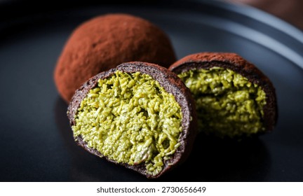 Close-up of a Dubai Chewy Cookie split open, showing a rich pistachio and kataifi filling.