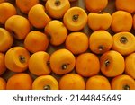 Close-up of Dungsi Persimmons with skins peeled off for dried persimmon at Sango-ri near Sangju-si, South Korea 
