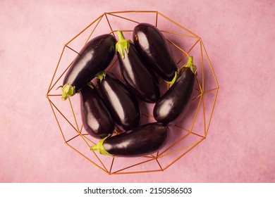 Closeup Of Eggplants In An Iron  Bowl