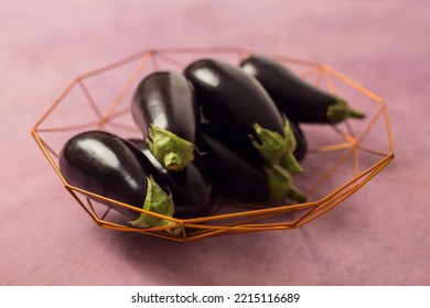 Closeup Of Eggplants In An Iron  Bowl