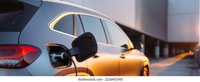 Close-up of electric car charging, ecology transportation conept. - Shutterstock ID 2216455343