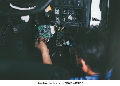 Close-up Of Electronic Controller Board ,Automobile Harness And Wire Repair ,Car Wiring Harness Restoration.