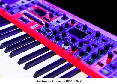 Close-up Of An Electronic Synthesizer On A Dark Background